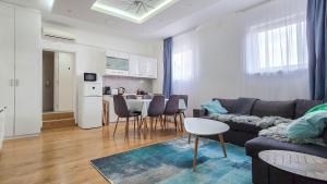 Kuchyňa alebo kuchynka v ubytovaní Centrum Charm Apartment