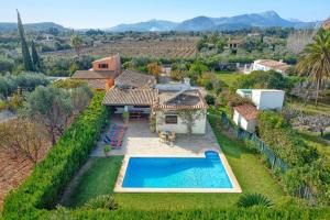 an aerial view of a house with a swimming pool at Villa Vinya Maria by Villa Plus in El Port