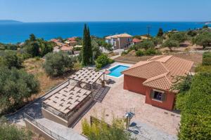 an aerial view of a house with a swimming pool at Villa Meliti Kefalonia by Villa Plus in Lourdhata