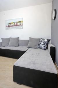 Postel nebo postele na pokoji v ubytování Apartments Šime