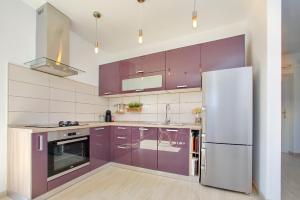 Kuchyň nebo kuchyňský kout v ubytování Apartments Šime