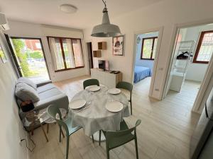 Ένα ή περισσότερα κρεβάτια σε δωμάτιο στο Casa al mare con giardino e parcheggio privato!