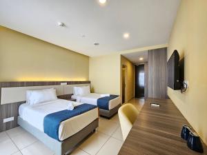 Postel nebo postele na pokoji v ubytování Grand Ion Delemen Premium Suites Genting Highlands + 34 fotografií