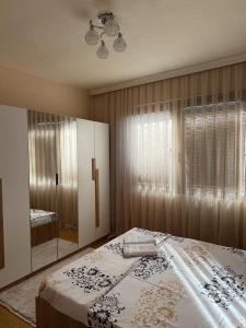 Postel nebo postele na pokoji v ubytování Corner Apartments