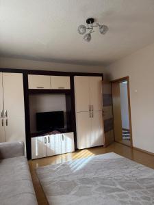 Postel nebo postele na pokoji v ubytování Corner Apartments