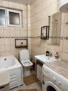 Koupelna v ubytování Corner Apartments + 3 fotografie