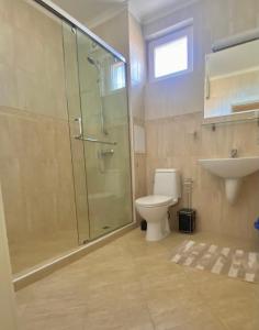 A bathroom at Apartments in complex ATIA RESORT