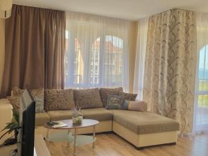 A seating area at Apartments in complex ATIA RESORT