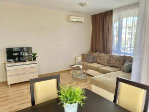 A seating area at Apartments in complex ATIA RESORT