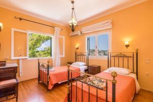 Posteľ alebo postele v izbe v ubytovaní Villa Angela by Villa Plus