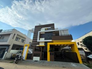 a building with a motorcycle parked in front of it at Sapthagiri Euphoria in Chikmagalūr