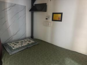 Postel nebo postele na pokoji v ubytování Sapthagiri Euphoria
