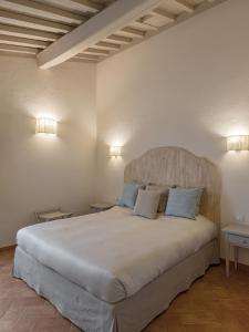 Postel nebo postele na pokoji v ubytování Resort Casale Le Torri