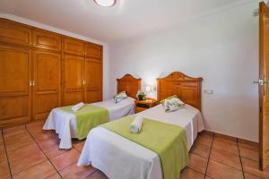 Postel nebo postele na pokoji v ubytování Villa Seniola by Villa Plus + 19 fotografií