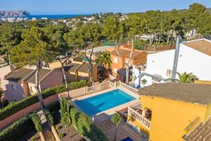 an aerial view of a house with a swimming pool at Villa Verde by Villa Plus in Balcon del Mar