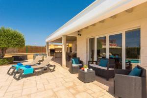 Posezení v ubytování Villa Gris by Villa Plus