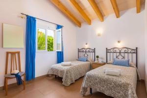 Postel nebo postele na pokoji v ubytování Villa Gris by Villa Plus