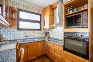 A cozinha ou kitchenette de Villa Ocean Bay Funchal By Empório