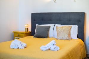 Uma cama ou camas num quarto em Villa Ocean Bay Funchal By Empório