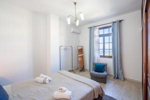 Uma cama ou camas num quarto em Villa Ocean Bay Funchal By Empório