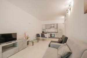Kuchyň nebo kuchyňský kout v ubytování Appartamento Residence Mimose
