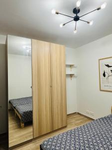 Postel nebo postele na pokoji v ubytování Xlendi cliffs