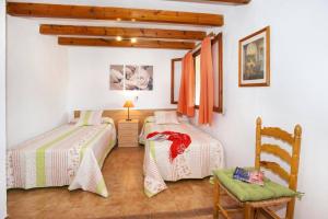 Postel nebo postele na pokoji v ubytování Villa Can Pinto by Villa Plus + 21 fotografií