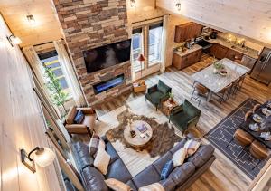 an overhead view of a living room and kitchen at Luxury Gatlinburg Cabin, Heated Pool, Theater, Hot Tub in Gatlinburg
