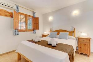 Postel nebo postele na pokoji v ubytování Villa Trampsana by Villa Plus
