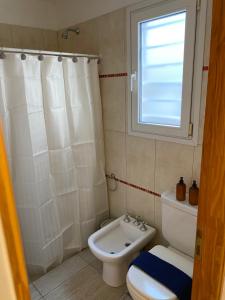 Ein Badezimmer in der Unterkunft Complejo Pampa