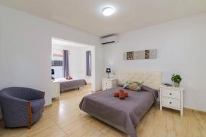 Posteľ alebo postele v izbe v ubytovaní Villa Esmeralda by Villa Plus