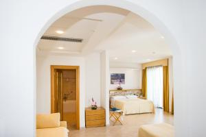 A bed or beds in a room at Hotel Terminal - Caroli Hotels