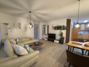 Posezení v ubytování Ferienwohnung in Krumpendorf am Wörthersee + 11 fotografií