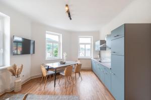 Køkken eller tekøkken på Benville Freital - 2 Schlafzimmer - Wohnküche - WLAN