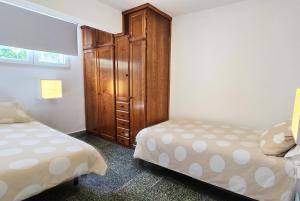 Posteľ alebo postele v izbe v ubytovaní Innhome - La Marina