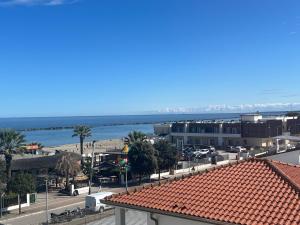 a view of a city with a beach and buildings at Casa Blu di Pomposa Vista Mare in Lido di Pomposa