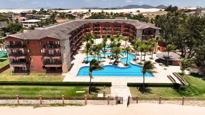 an aerial view of a resort with a swimming pool at Kariri Beach Residence in Caucaia