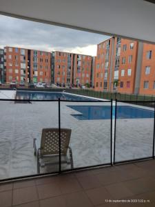 Πισίνα στο ή κοντά στο Apartamento vacacional con parqueadero y piscina