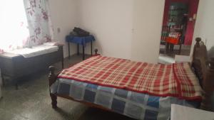 Gulta vai gultas numurā naktsmītnē Departamento 3 dormitorios en Santiago del Estero Capital
