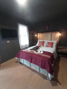 Letto o letti in una camera di Oldtown Chihuahua