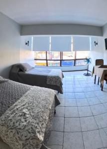 Postelja oz. postelje v sobi nastanitve Hotel Qamiri