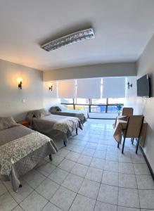 Postelja oz. postelje v sobi nastanitve Hotel Qamiri