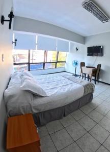 Postelja oz. postelje v sobi nastanitve Hotel Qamiri