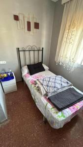 Postel nebo postele na pokoji v ubytování La Nueva