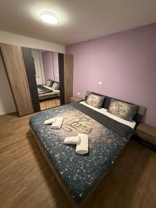 Postel nebo postele na pokoji v ubytování Apartma Sunshine