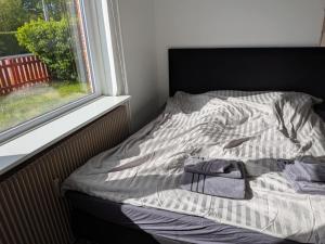 Un pat sau paturi într-o cameră la Pet-Friendly Apartment 2 60m2 - close to Femern & Puttgarden & Lalandia & Knuthenborg