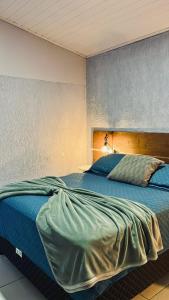 Postel nebo postele na pokoji v ubytování Pousada Aguas do Mampituba