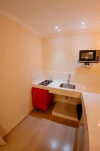 Η κουζίνα ή μικρή κουζίνα στο Chalé Montana Pedra Azul