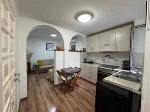 Kuchyň nebo kuchyňský kout v ubytování Double17 Apartaments