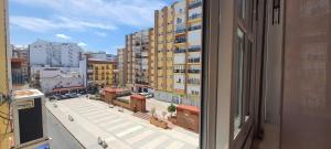 Nespecifikovaný výhled na destinaci Huelva nebo výhled na město při pohledu z ubytování v soukromí